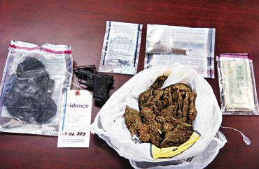Burglary arrest nets drugs and guns