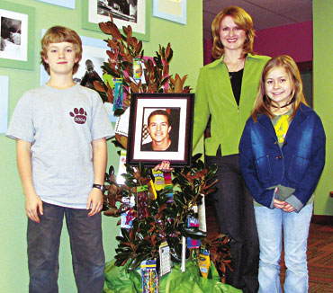 Jordan family plants magnolia tree to honor father