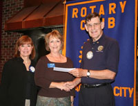 PTC Rotary presents check to Fayette Senior Services