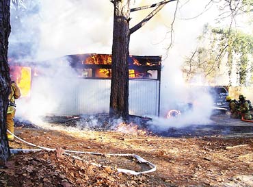 Blaze damages Sweetgum home