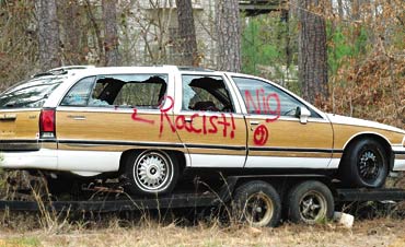 Neighborhood reels from racist graffiti