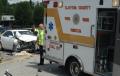 Crash_ambulance vs car at Capt. D's
